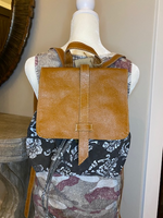 
              Flower and Leather Backpack
            