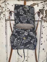 
              Flower and Leather Backpack
            